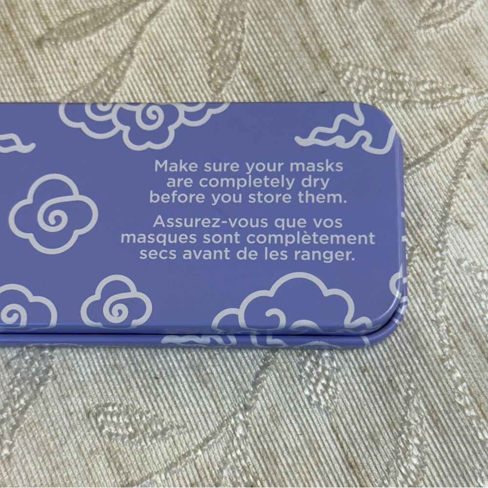 Pacifica Reusable Undereye Mask set with a cloud pattern in closed tin. - Picture 3 of 5